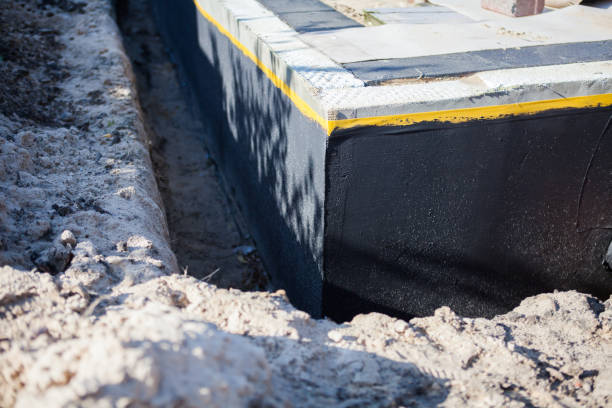 Professional Emergency Waterproofing technician working in Dansville, MI